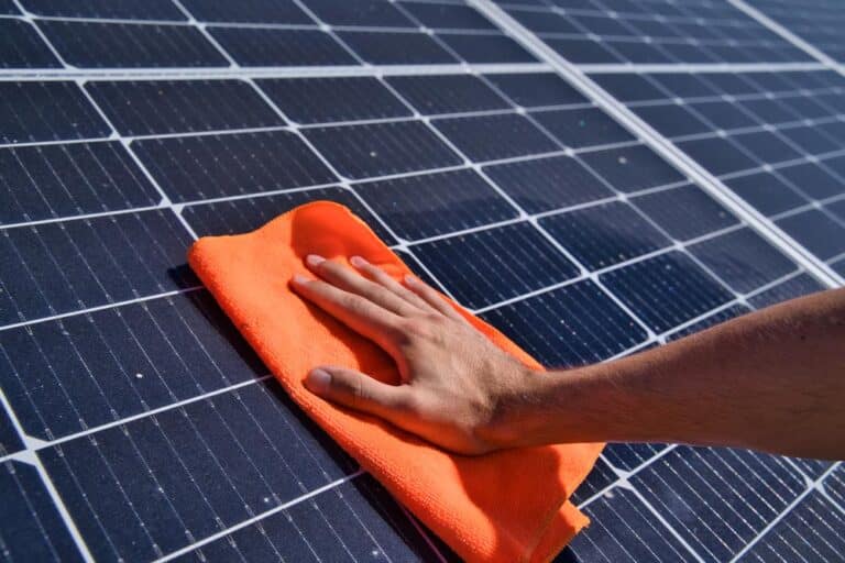 Cleaning Solar Panel With Damp Cloth