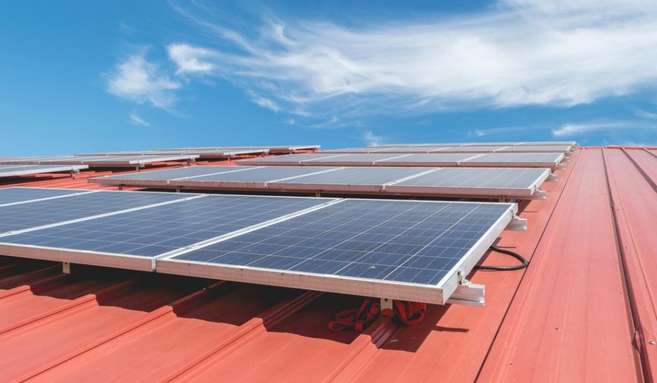Solar Panel On Red Roof Tile