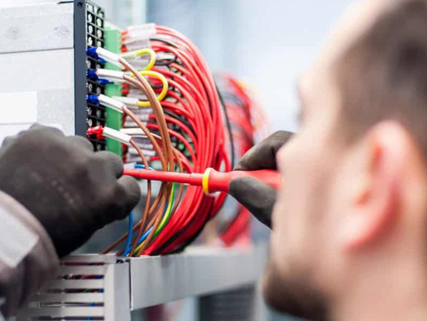 Closeup of electrician engineer works — Residential Electrician in Buderim, QLD